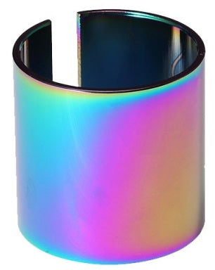 The Blunt Envy Scooter Clamp Shim in Oil Slick Neochrome is a cylindrical, iridescent metallic object with a vertical cut along its side. It displays a gradient of colors including blue, pink, and yellow, resembling an oversized clamp standing upright against a white background.