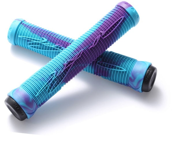 On a white background, the Fasen Fast Teal / Purple Stunt Scooter Grips - 160mm are displayed in a crossed arrangement. One grip showcases dual tone colors of teal with purple accents, and the other is primarily purple with teal accents. Made by Fasen from a super soft compound, both grips feature a textured surface for enhanced grip, making them ideal for stunt scooter enthusiasts.