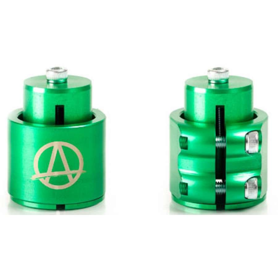 Two cylindrical green metallic components, the left one featuring an Apex logo, and the right being an Apex aluminium double clamp with two screws on its side. Both have a polished finish and are designed for mechanical use in stunt scooter assembly.