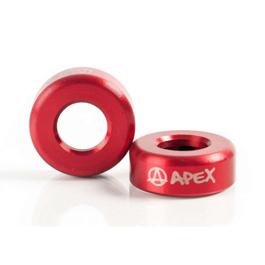 Two durable Apex Aluminium Scooter Bar Ends in red, crafted from metal with a cylindrical shape and central holes, are displayed. One stands upright while the other lies flat, showcasing the "APEX" logo etched on its reflective surface. They are suitable for all types of scooter bars.