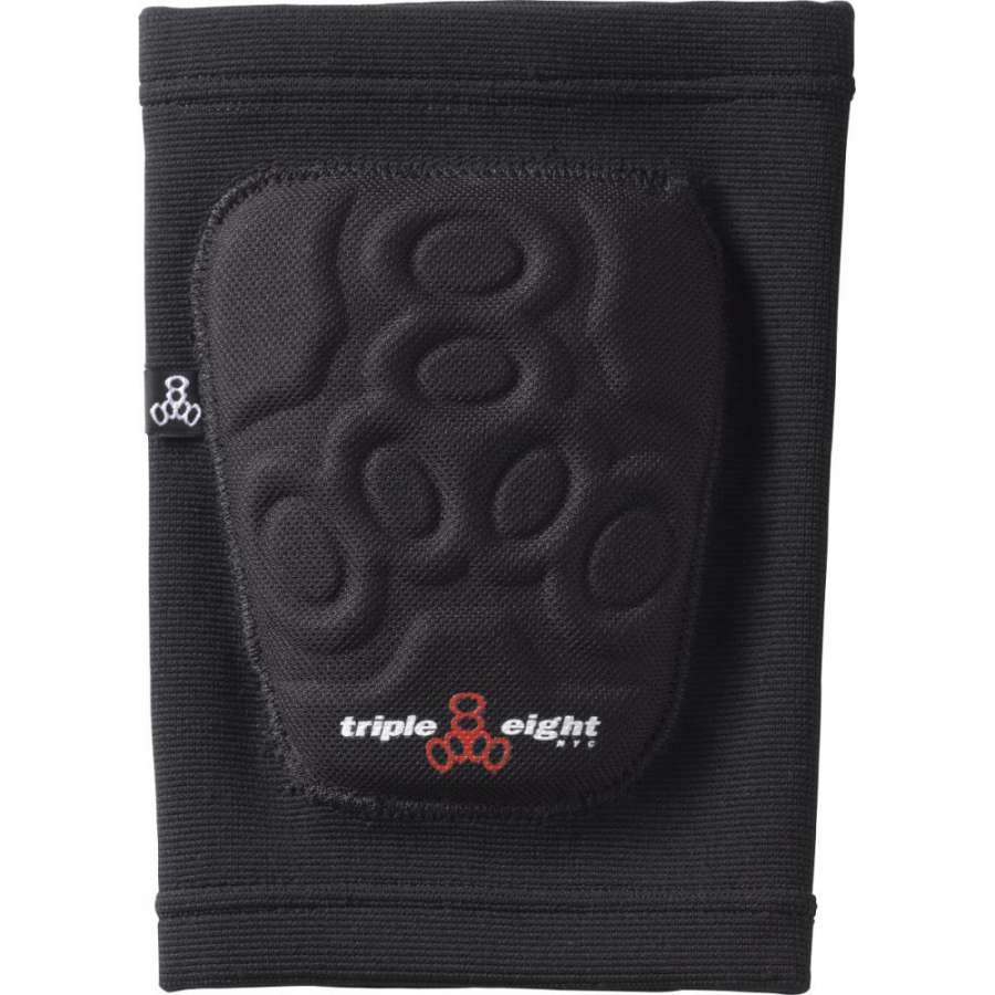 The Triple 8 Covert Knee Skate Protection Pads in Black, by Triple 8, feature a smooth black design with textured padding and the classic "triple eight" logo in white and red. These pads provide knee protection with an ergonomic, flexible, and non-restrictive fit for exceptional comfort during any adventure.