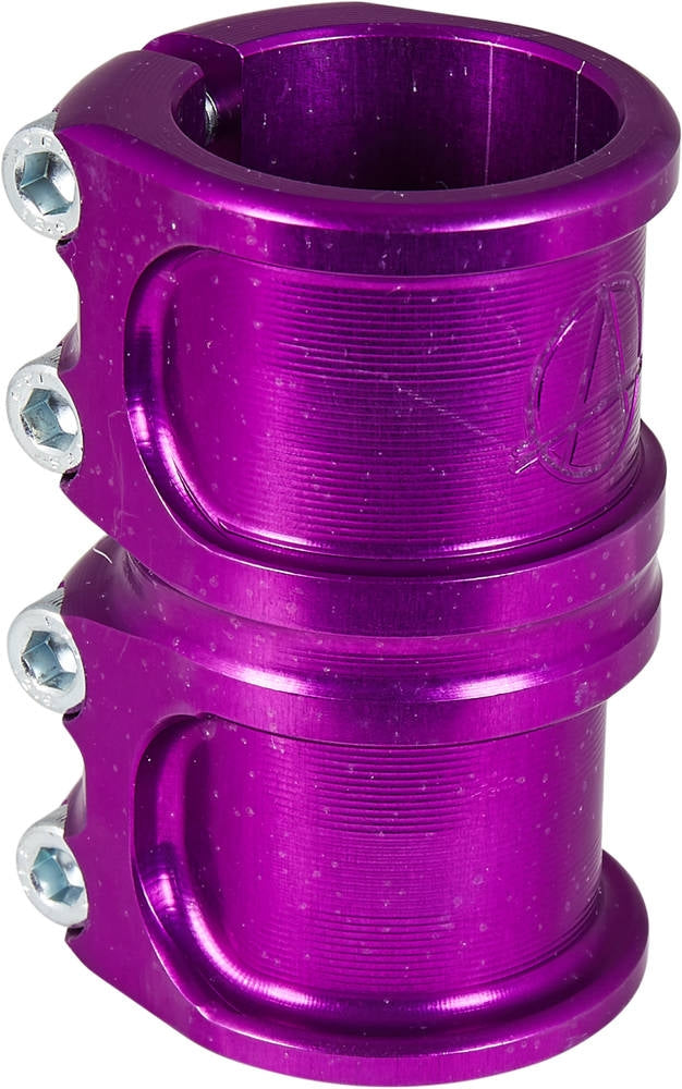 A detailed view of the purple Apex Lite 4 Bolt Oversized SCS Stunt Scooter Clamp showcases four distinct screws. Crafted from CNC machined 7075 aluminum, this clamp features a sleek, cylindrical design with a glossy finish and bears an engraved logo on the side. It exudes durability and industrial strength, making it perfect for secure fastening.