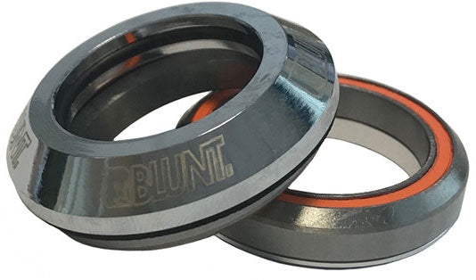 Close-up of two smooth bearings from the Blunt Envy Integrated Stunt Scooter Headset - Silver Chrome, with "BLUNT" engraved on one. They boast a shiny silver finish and orange accents, subtly stacked to emphasize their cylindrical form. Their sleek design is enhanced by an aluminum top cap.