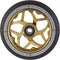 A detailed view of the Striker Essence V3 110mm Scooter Wheel showcases its metallic gold and black design, featuring a spoked aluminum core in a star-like pattern. The outer edge bears the words, "STRIKER ESSENCE WHEEL V3 ONE HUNDRED AND TEN MILLIMETERS," while the tire is equipped with an ABEC-9 bearing for an ultra-smooth finish.