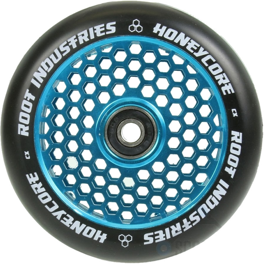 The Root Industries Honeycore 110mm Stunt Scooter Wheel in Black and Blue showcases a captivating honeycomb pattern with "Root Industries" and "Honeycore" elegantly displayed in white letters on the black outer edge. Root bearings at its center guarantee superior performance.