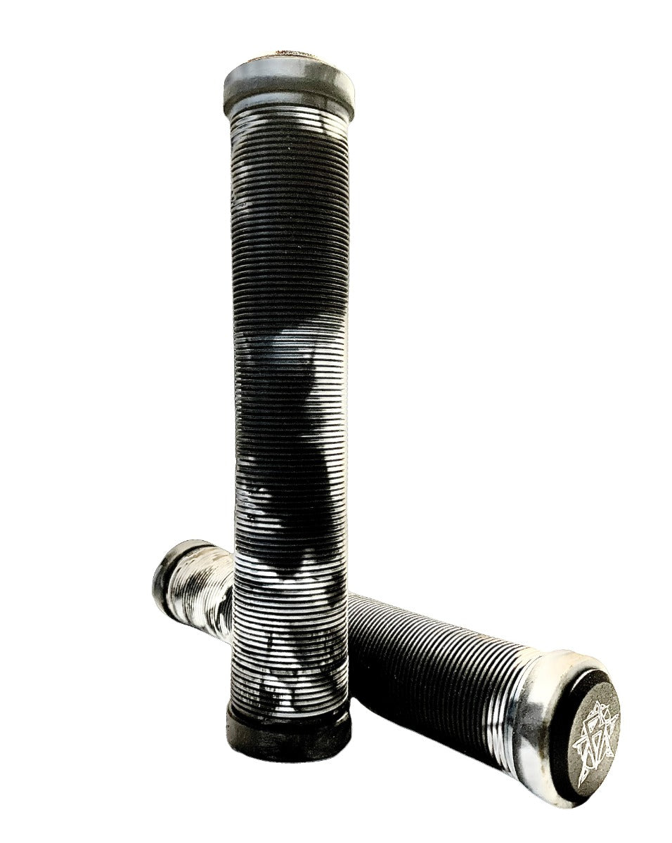 The Revolution Fused Black / White Stunt Scooter Grips - 172mm from Revolution showcase a black and white marbled pattern with ribbed textures, perfect for revolutionizing your ride. One grip stands upright while the other lies horizontally, both featuring logos on the end caps that evoke high-performance stunt scooter grips.