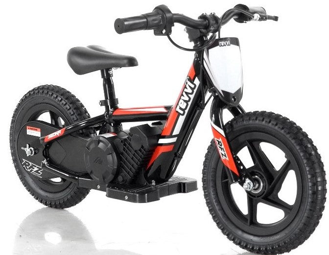 Introducing the Revvi 12" Kids Electric Balance Bike in a vibrant red color. Designed by Revvi for balance learning and progression, it features a lightweight electric motorbike structure, thick tires, a padded seat, and a central motor. This sleek design stands out against the white background.