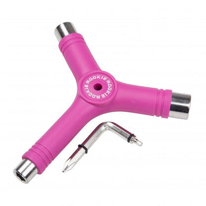 The Rookie Roller Skate Multi Tool - Pink by Rookie is a versatile Y-shaped tool featuring three sockets at each end and a detachable screwdriver, ideal for maintaining both roller skates and skateboards.