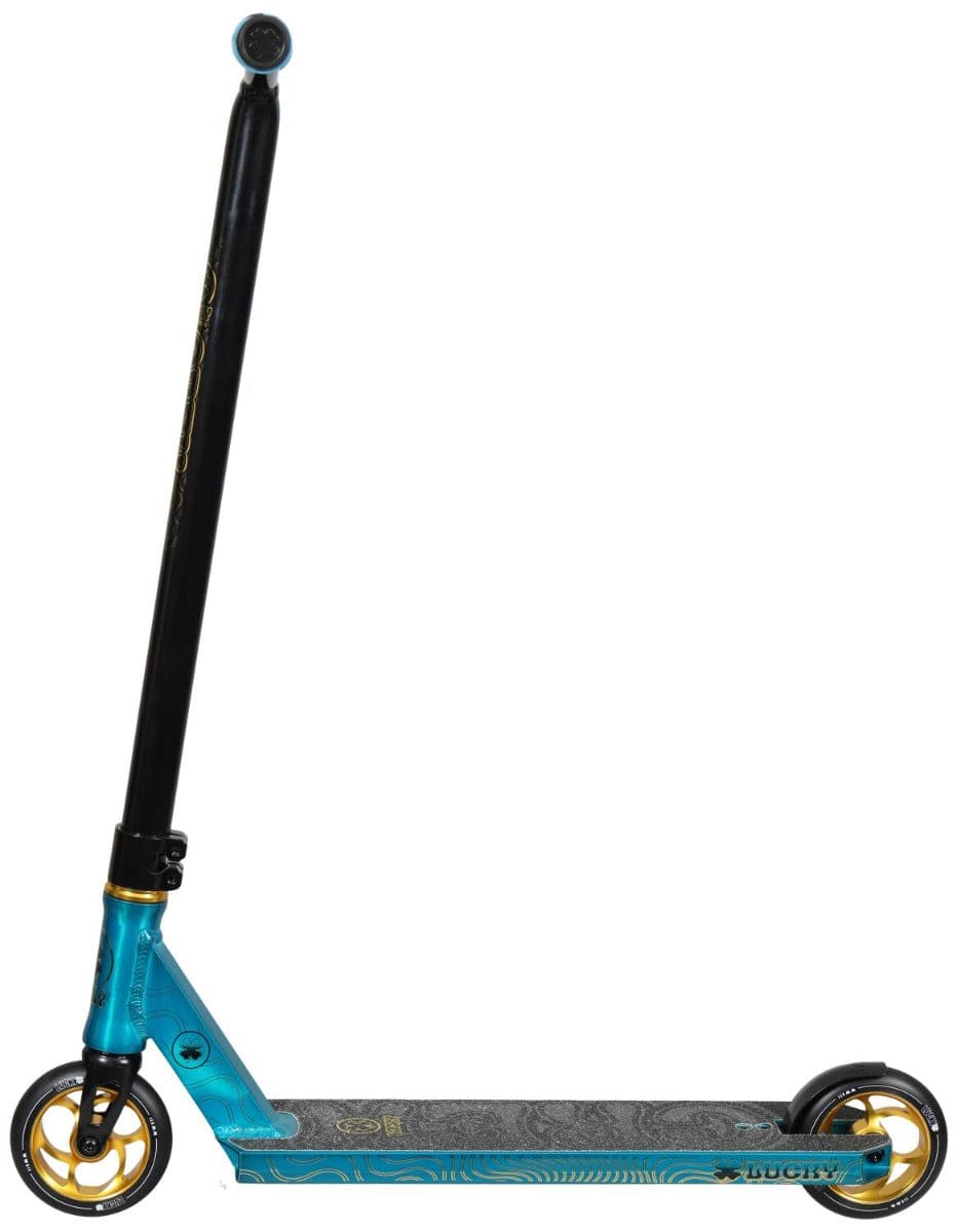 The Lucky Crew 2022 Complete Stunt Scooter - Royale by Lucky is a sleek pro stunt scooter, adorned with its striking teal and black color scheme and highlighted with gold wheels. It boasts a long, lightweight aluminum bar handlebar and features a textured grip deck, allowing the scooter to stand upright from the side, poised for your next trick.