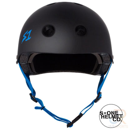 The S1 Lifer Skate / Scooter Helmet in Matte Black / Cyan features a cyan "S1" logo on the side. It includes ventilation holes, a cyan adjustable chin strap, and EPS Fusion Foam padding inside for enhanced comfort and safety. The "ONE HELMET CO." logo appears in black on a white background in the bottom right corner.