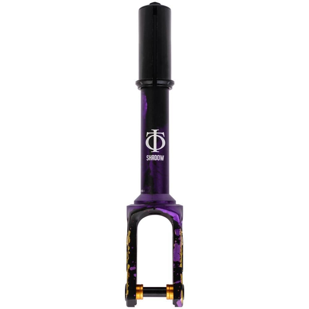 The Oath Shadow IHC Stunt Scooter Fork features a striking black and purple cylindrical design with speckles of gold near the base, crafted from durable 6061 T6 Aluminium. It proudly displays the iconic “Shadow Fork” logo in white, making it a standout piece within and beyond the scooter market.