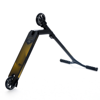 This Nitro Circus Ryan Williams Signature Replica 2022 Complete Stunt Scooter in black showcases two small wheels as part of its design. The scooter's ridged deck texture and angled handlebars contribute to its streamlined appearance, while the slightly elevated rear wheel accentuates its sporty aesthetic.