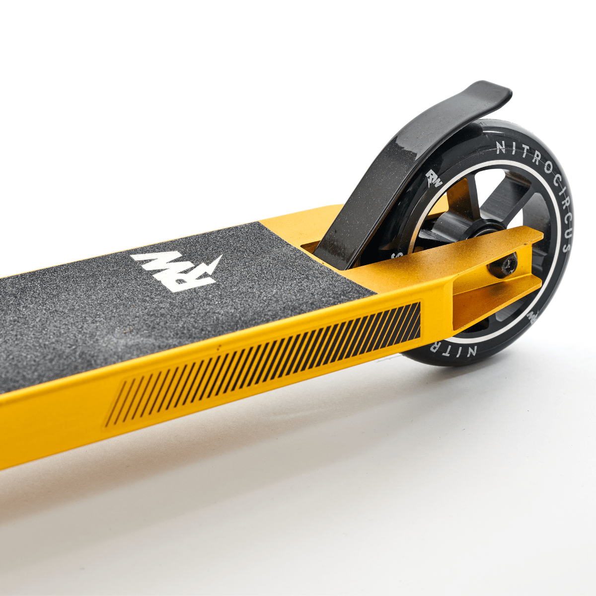 Close-up of the rear section of the Nitro Circus Ryan Williams Signature Replica 2022 Complete Stunt Scooter in gold and black, featuring a textured deck and wheel. The "Nitro Circus" brand name is visible, highlighting its sleek, modern design. This scooter is perfect for beginners eager to emulate Ryan Williams' daring feats.