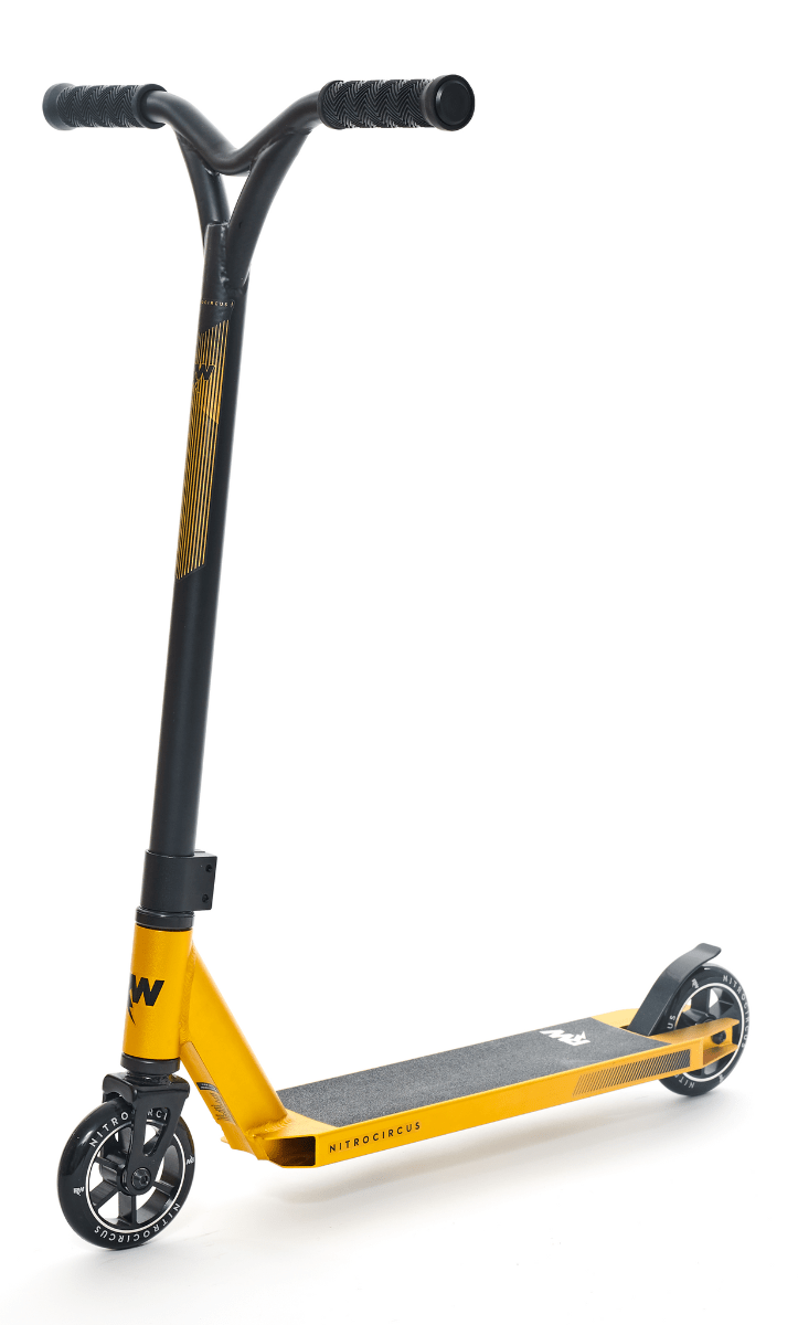 The Nitro Circus Ryan Williams Signature Replica 2022 Complete Stunt Scooter in stunning gold and black showcases a textured deck, rubber grips, and small wheels with clear rims. The brand name is boldly displayed on the front, making this scooter pop against a white background. Ideal for beginners eager to leave an impression.