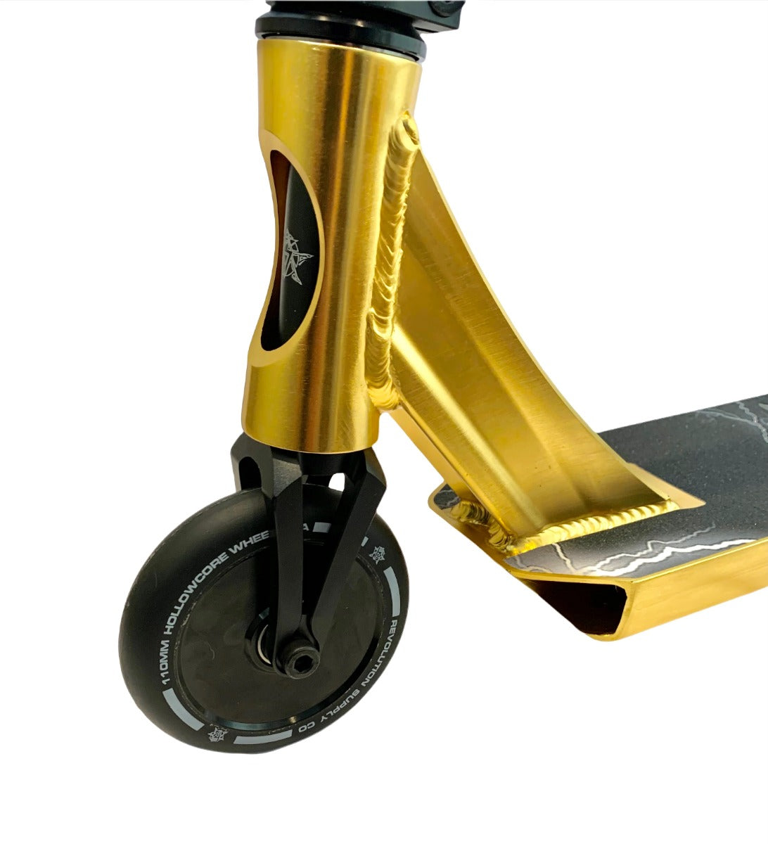 Here's a revised version of the sentence using the provided product data:

Close-up of the Revolution Storm Complete Stunt Scooter - Gold Chrome by Revolution, showcasing its front section with a black wheel adorned with white text, a sleek gold chrome fork, and a textured deck. This lightweight scooter features a modern and stylish design, ideal for the skatepark.