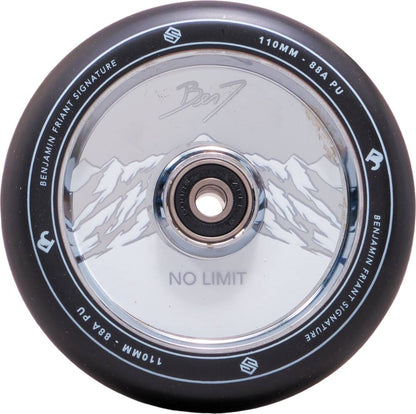 A close-up view of the Striker Benj No Limit 110mm Stunt Scooter Wheel in black and chrome silver reveals a mountain design on the core with "No Limit" text. The outer edge features "Benjamin Franks Signature" and specifications "110mm 88A PU," constructed from robust Aluminum 6061, capturing the essence of the Striker Benj No Limit Signature style.