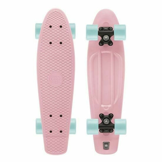 Two Xootz 22" Retro Cruiser Skateboards in pastel pink, featuring textured tops and light blue wheels, are displayed. One skateboard is shown from above, showcasing its grip pattern ideal for beginner skaters, while the other is depicted from below, emphasizing its wheels and trucks designed for smooth city cruising.